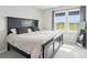 Bedroom featuring a large window and neutral color scheme at 5712 Runnel Way, Charlotte, NC 28215