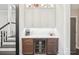 Butler's pantry with beverage cooler and white marble countertops at 5712 Runnel Way, Charlotte, NC 28215