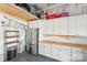 Well-organized garage with epoxy floors and cabinet storage at 5712 Runnel Way, Charlotte, NC 28215