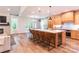 Spacious kitchen with a large island, seating, stainless appliances, and plenty of natural light at 602 Kames Nw Ct, Conover, NC 28613