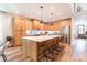 Large kitchen with a spacious island, wood cabinetry, and stainless steel appliances at 602 Kames Nw Ct, Conover, NC 28613