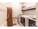 Bright laundry room featuring modern appliances and stylish decor for an efficient laundry experience at 602 Kames Nw Ct, Conover, NC 28613