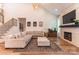 Inviting living room with stairs, featuring a plush sofa, stylish lighting, and a cozy atmosphere at 602 Kames Nw Ct, Conover, NC 28613