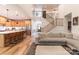 Open floor plan featuring a kitchen, living room, and staircase with modern finishes at 602 Kames Nw Ct, Conover, NC 28613