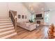 Bright, open-concept living space with modern fireplace, lighting, and seating, ideal for entertaining at 602 Kames Nw Ct, Conover, NC 28613