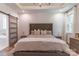 Spacious main bedroom featuring a tufted headboard and an abundance of natural light at 602 Kames Nw Ct, Conover, NC 28613