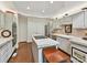 Well-appointed kitchen with modern appliances, tile countertops, and ample storage space at 6645 Gaywind Dr, Charlotte, NC 28226