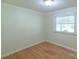 Bright bedroom with hardwood floors, a window, and neutral paint at 6813 Rebel Rd, Marshville, NC 28103
