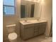 Bathroom featuring a double sink vanity with gray cabinets and tile floor at 756 Gondola Ct # 127, Salisbury, NC 28144