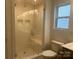Modern bathroom featuring a glass-enclosed shower and neutral decor at 756 Gondola Ct # 127, Salisbury, NC 28144
