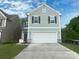 Charming two-story home with a two-car garage and manicured front lawn at 756 Gondola Ct # 127, Salisbury, NC 28144