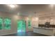 Bright, open kitchen with white cabinets, stainless steel appliances, and center island at 756 Gondola Ct # 127, Salisbury, NC 28144