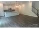 Spacious living room with hardwood floors that open to a bright kitchen at 756 Gondola Ct # 127, Salisbury, NC 28144