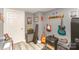 Basement music room featuring guitars, amplifiers, and sound equipment at 8300 Loma Linda Ln, Waxhaw, NC 28173