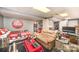 Open basement bedroom with lounging area and a walk in closet at 8300 Loma Linda Ln, Waxhaw, NC 28173