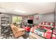 Finished basement includes lounging area with a large window for natural light at 8300 Loma Linda Ln, Waxhaw, NC 28173