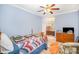 Spacious bedroom with a ceiling fan and view of an adjacent bathroom at 8300 Loma Linda Ln, Waxhaw, NC 28173