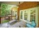 Rear deck with seating and a wooded view at 8300 Loma Linda Ln, Waxhaw, NC 28173