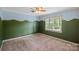 Carpeted bedroom features a two-tone wall and a window offering ample natural light at 836 Meadowlark Dr, Rock Hill, SC 29732