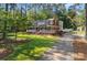 Beautiful two-story home with a full front porch and well-maintained yard, surrounded by mature trees at 836 Meadowlark Dr, Rock Hill, SC 29732