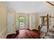 Bright foyer with hardwood floors, white trim, and a view of the front yard through the open doorway at 836 Meadowlark Dr, Rock Hill, SC 29732