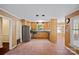 Spacious kitchen featuring stainless steel appliances, wood cabinets, and decorative tile flooring at 836 Meadowlark Dr, Rock Hill, SC 29732