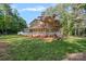Exterior view of a two-story home with a covered porch and a large landscaped yard at 836 Meadowlark Dr, Rock Hill, SC 29732