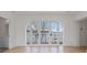 Bedroom with a view of the lake, hardwood flooring and white trim at 8397 Ranger Island Marina Rd, Denver, NC 28037