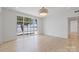Bright bedroom with wood floors and large windows with lake views at 8397 Ranger Island Marina Rd, Denver, NC 28037