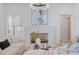 Bright living room features a decorative fireplace, neutral palette, and a modern chandelier at 8397 Ranger Island Marina Rd, Denver, NC 28037