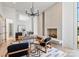 Modern office with herringbone fireplace, area rug and modern furnishings at 8397 Ranger Island Marina Rd, Denver, NC 28037