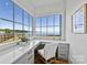 Office with lake view windows, white walls, and a white desk at 8397 Ranger Island Marina Rd, Denver, NC 28037