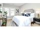 Cozy bedroom with natural light, neutral colors, and stylish decor at 908 W Airline Ave, Gastonia, NC 28052