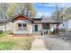 Charming single-story home with gray siding, orange trim, and a welcoming front porch at 908 W Airline Ave, Gastonia, NC 28052