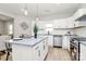 Kitchen island featuring a granite countertop, pendant lighting, and modern cabinetry at 908 W Airline Ave, Gastonia, NC 28052