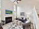 Spacious living room with vaulted ceilings, fireplace, and ample natural light at 9723 Mattforest Cir, Charlotte, NC 28277