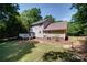 Spacious backyard featuring a wooden deck, providing ample space for entertaining at 122 Roxboro Ct # 286, Mount Gilead, NC 27306