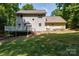 Backyard view of the home featuring a wooden deck perfect for relaxing outdoors at 122 Roxboro Ct # 286, Mount Gilead, NC 27306