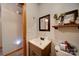 Bathroom features a mirror and neutral decor at 122 Roxboro Ct # 286, Mount Gilead, NC 27306