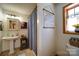 Cozy bathroom showcasing a pedestal sink and charming decor at 122 Roxboro Ct # 286, Mount Gilead, NC 27306