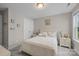 Bright bedroom featuring comfortable carpet, ample light, and calming decor at 1548 Striped Bass Ln, Clover, SC 29710
