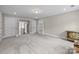 Large, carpeted bonus room with ample space at 1548 Striped Bass Ln, Clover, SC 29710