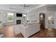 Comfortable living room with fireplace, stylish furniture, and abundant natural light at 1548 Striped Bass Ln, Clover, SC 29710
