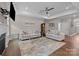 Cozy living room featuring a fireplace, comfortable seating, and stylish decor at 1548 Striped Bass Ln, Clover, SC 29710