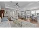 Open concept living area with kitchen, dining and living room with hardwood floors at 1548 Striped Bass Ln, Clover, SC 29710