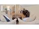 Bonus room featuring hardwood floors, comfortable seating, and a dedicated desk area at 2646 N Olivers Cross Rd, Newton, NC 28658