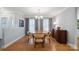 Bright dining room with chandelier, hardwood floors, and natural light at 2646 N Olivers Cross Rd, Newton, NC 28658