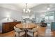 Dining Room featuring hardwood floors and views into kitchen and living room at 2646 N Olivers Cross Rd, Newton, NC 28658