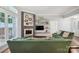 Living area features a fireplace, hardwood floors, and light grey paint at 2646 N Olivers Cross Rd, Newton, NC 28658