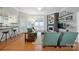 Living area features a fireplace, hardwood floors, and access to kitchen at 2646 N Olivers Cross Rd, Newton, NC 28658